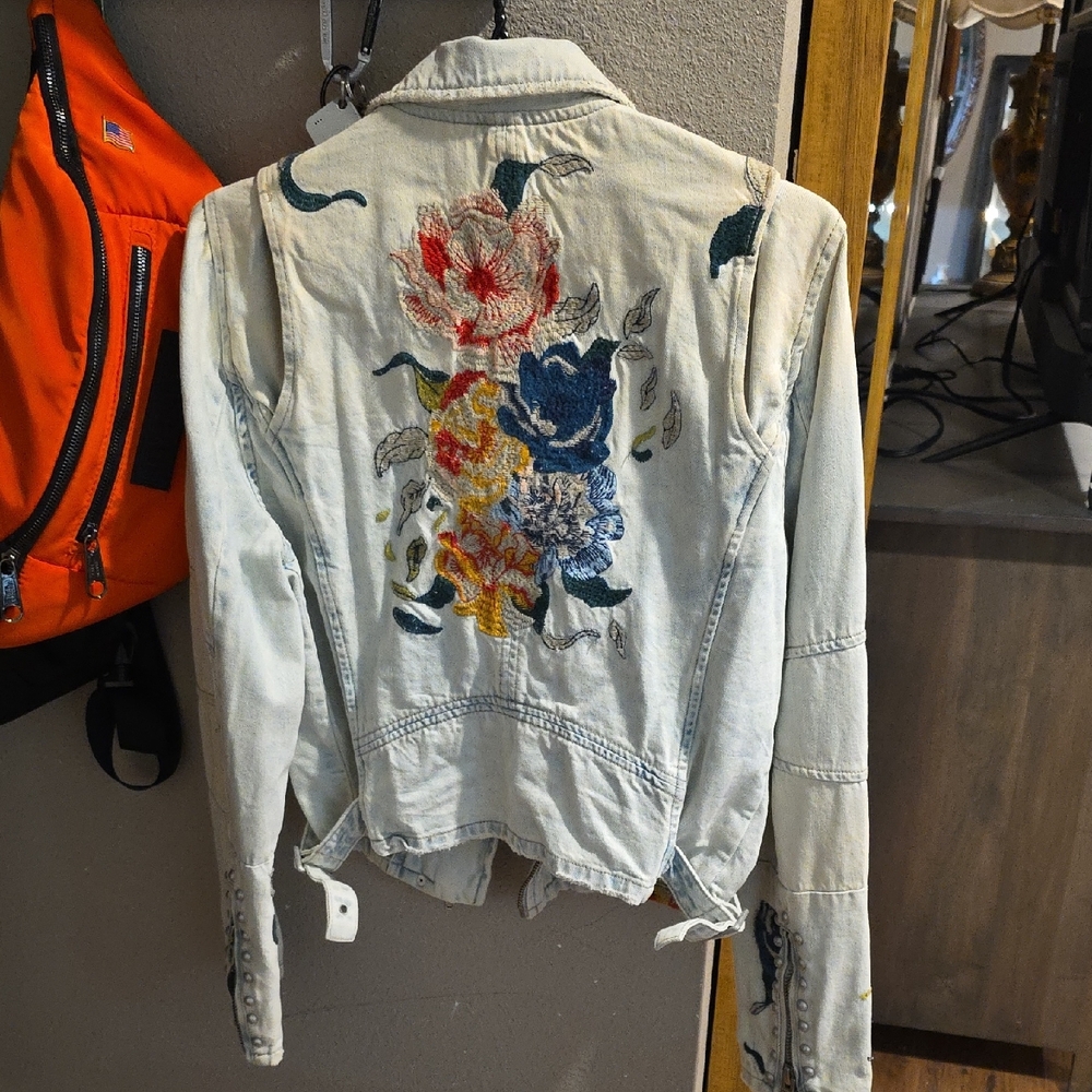 Blue Jean Jacket with Vibrant Floral Design
